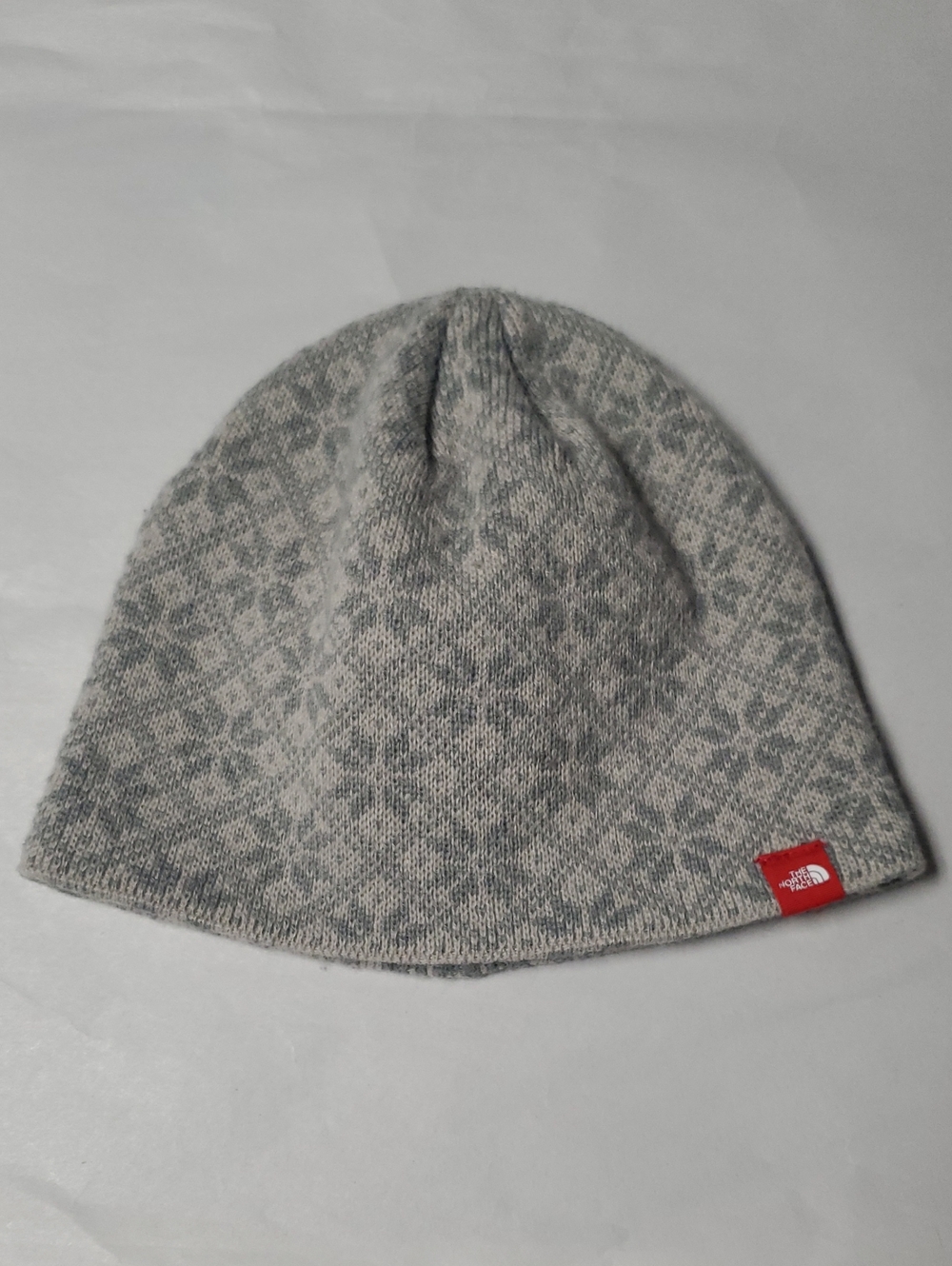 The North Face Grey Snowflake Nordic Knit Beanie with Red Logo Tag Girls Youth